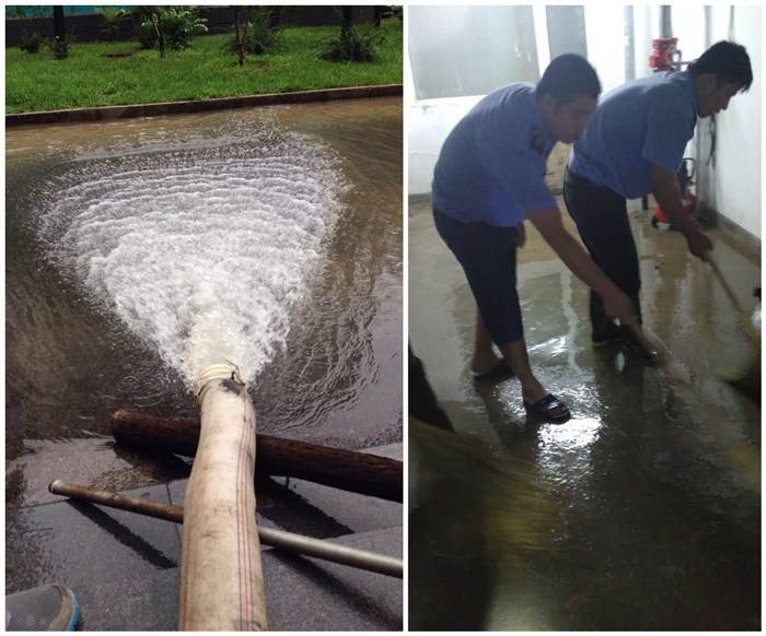 六里屯项目部正在地下室抽水        友谊嘉园项目部员工在清扫地下室